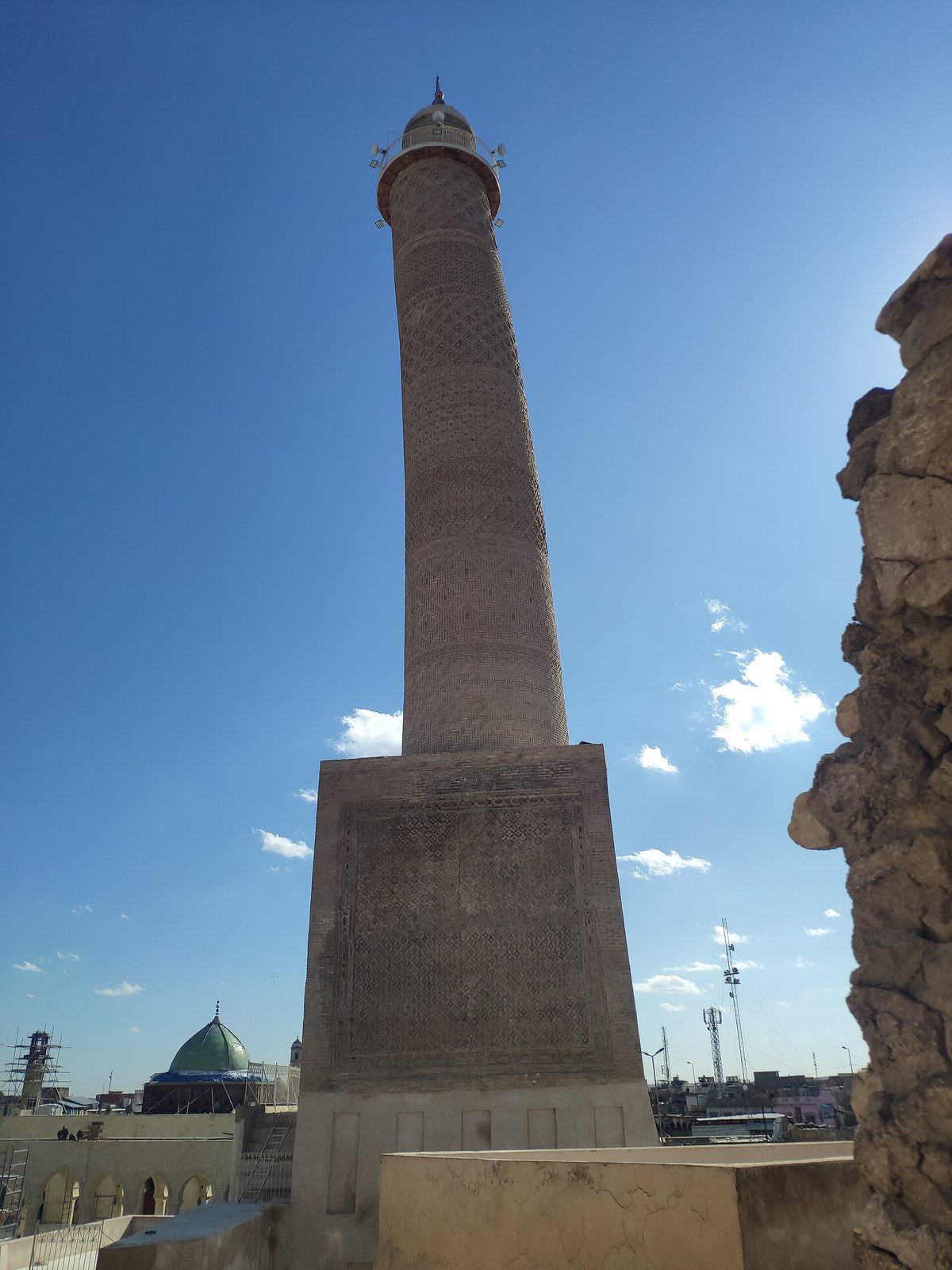 The rebuilt leaning al-Hadba minaret and green dome of the Great Mosque of al-Nuri in Mosul