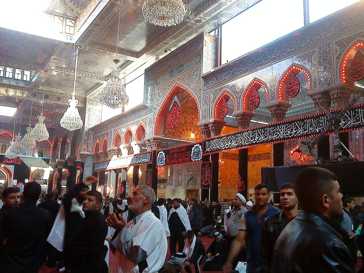 Pilgrims beneath the mirrored arches inside the Imam Hussain shrine complex, Karbala