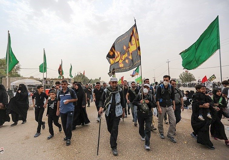 Pilgrims on the Najaf-Karbala road during Arbaeen, the world's largest annual gathering