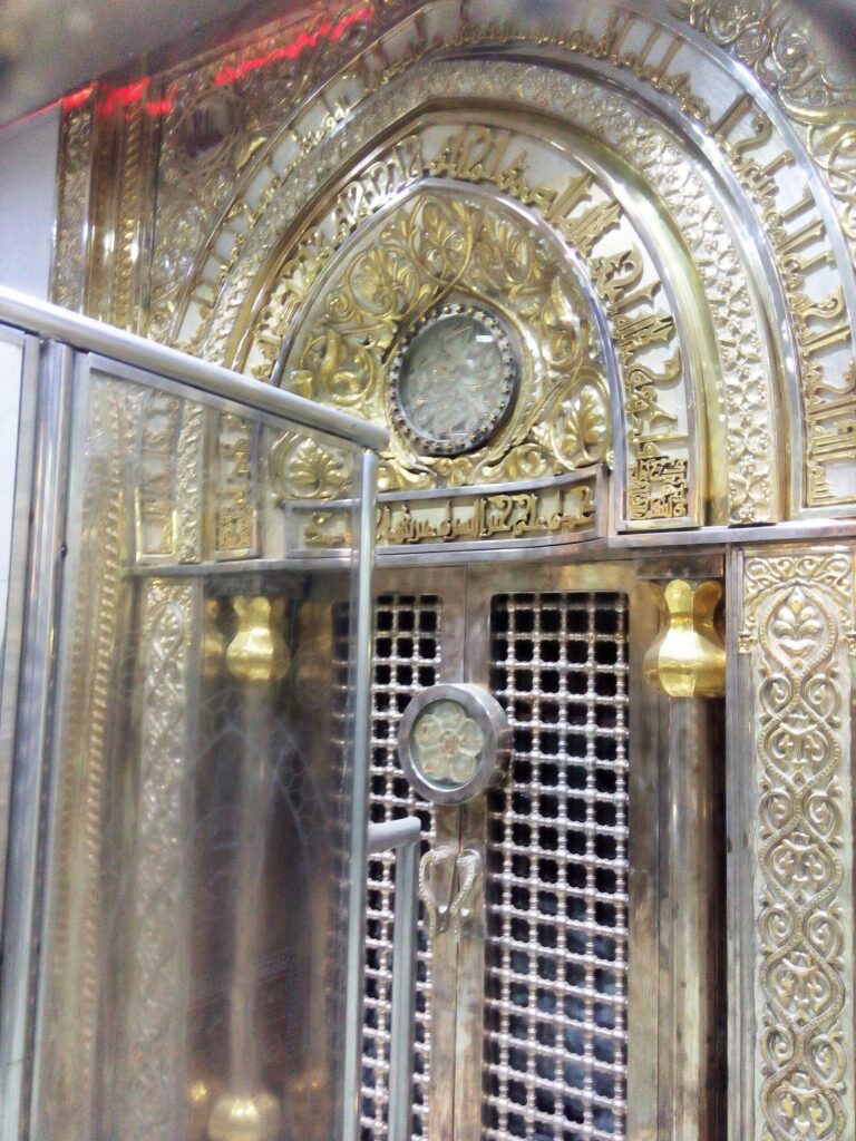 Silver and gold lattice enclosure over the mihrab inside the Kufa mosque