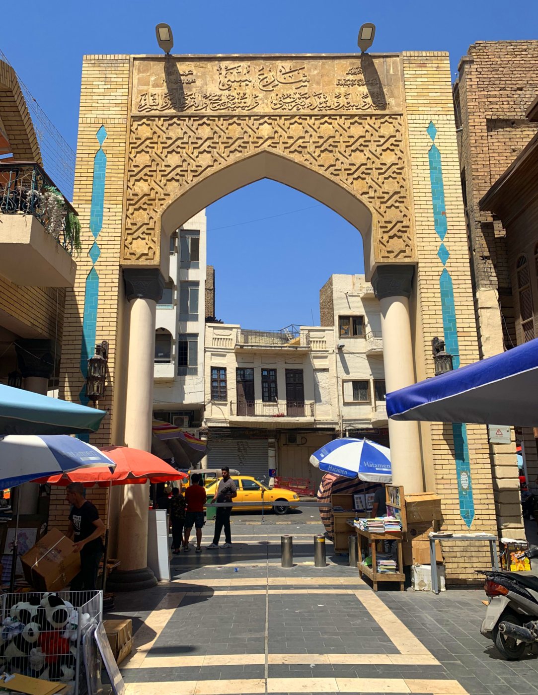 The ornamental arch at the entrance to Mutanabbi Street in Baghdad, decorated with Arabic calligraphy