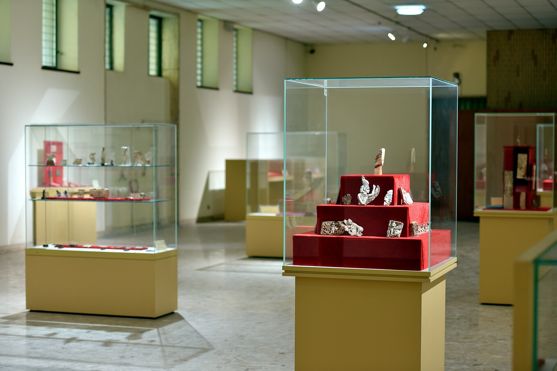 Display cases of carved ivory fragments in the Nimrud ivories hall of the Iraq Museum in Baghdad
