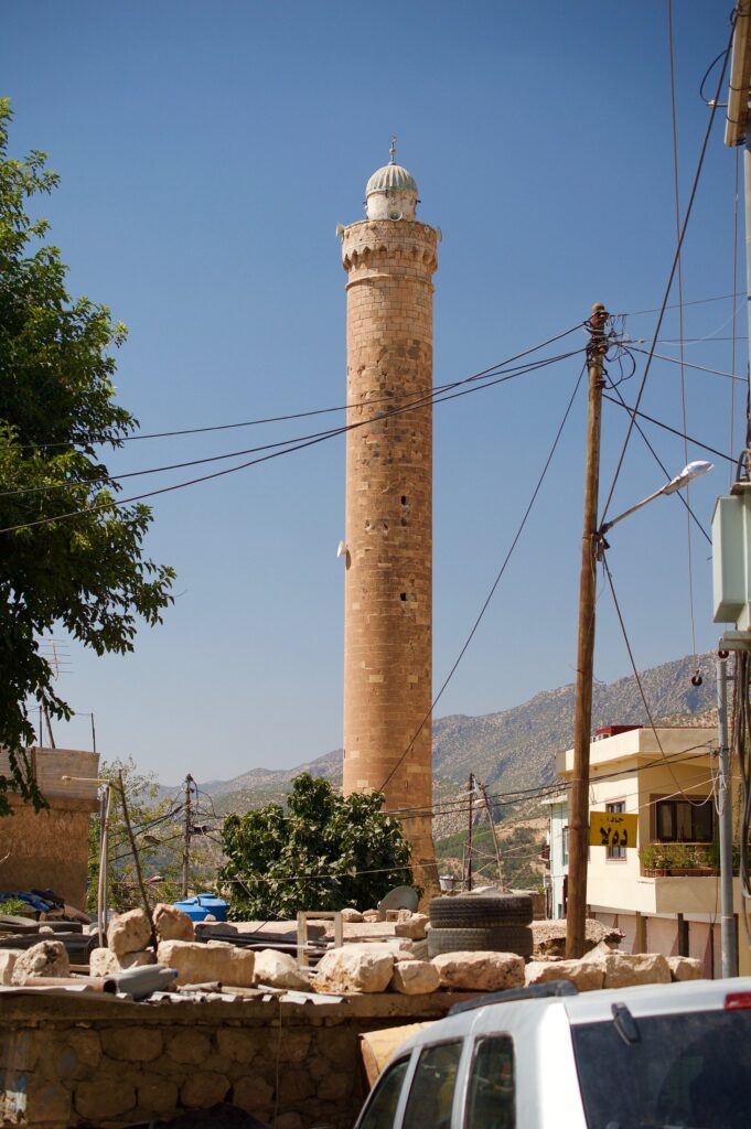 The minaret of the Great Mosque in Amedi against a blue sky