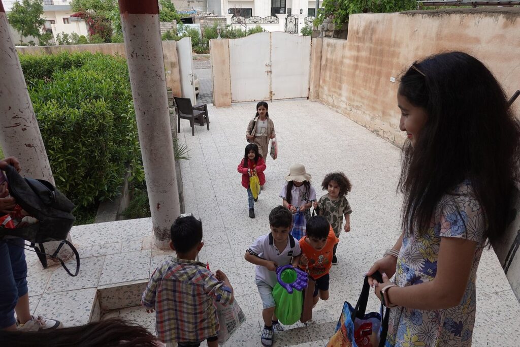 Children going from house to house for Eid al-Fitr sweets in Bahirka near Erbil, the festival that ends Ramadan in Iraq