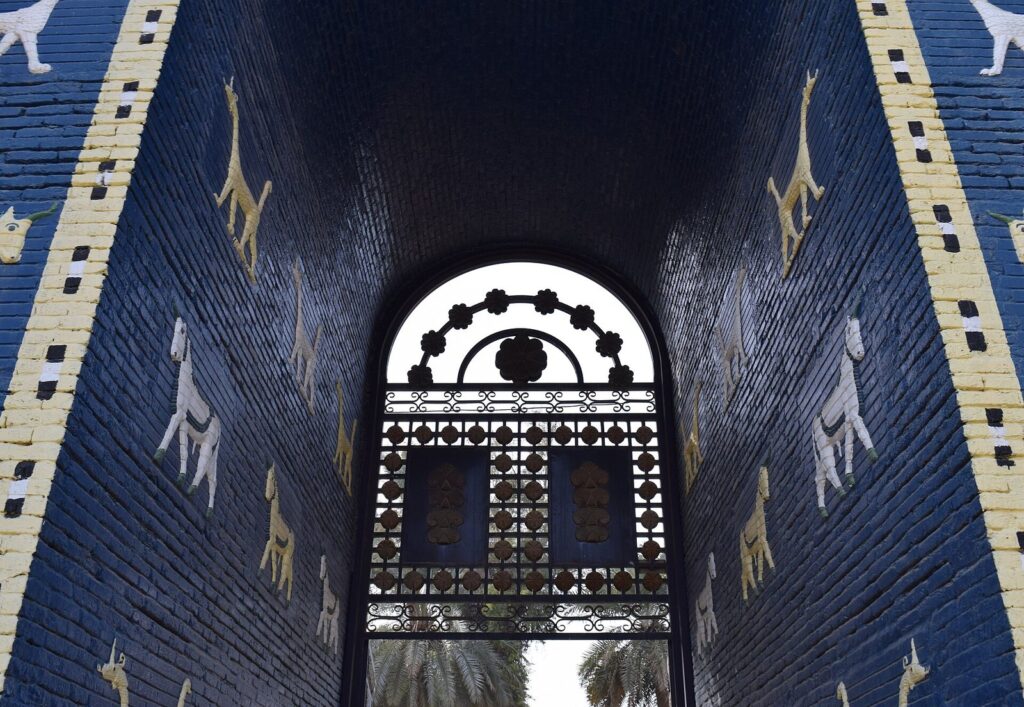 The blue glazed-brick replica of the Ishtar Gate at Babylon, with moulded animal figures