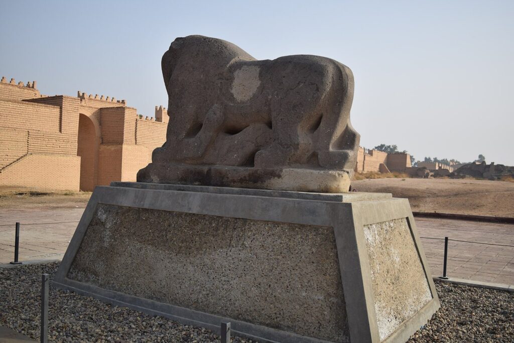 The basalt Lion of Babylon on its plinth among the ruins