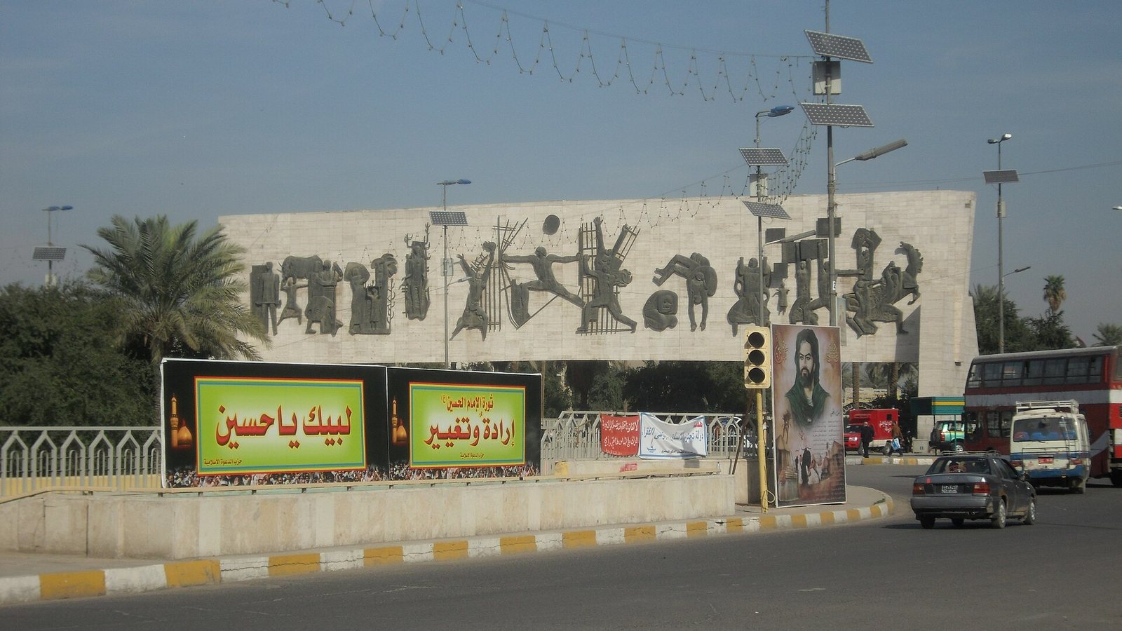 Jawad Saleem's Monument to Freedom, a long bronze frieze on a raised travertine wall above Tahrir Square in Baghdad