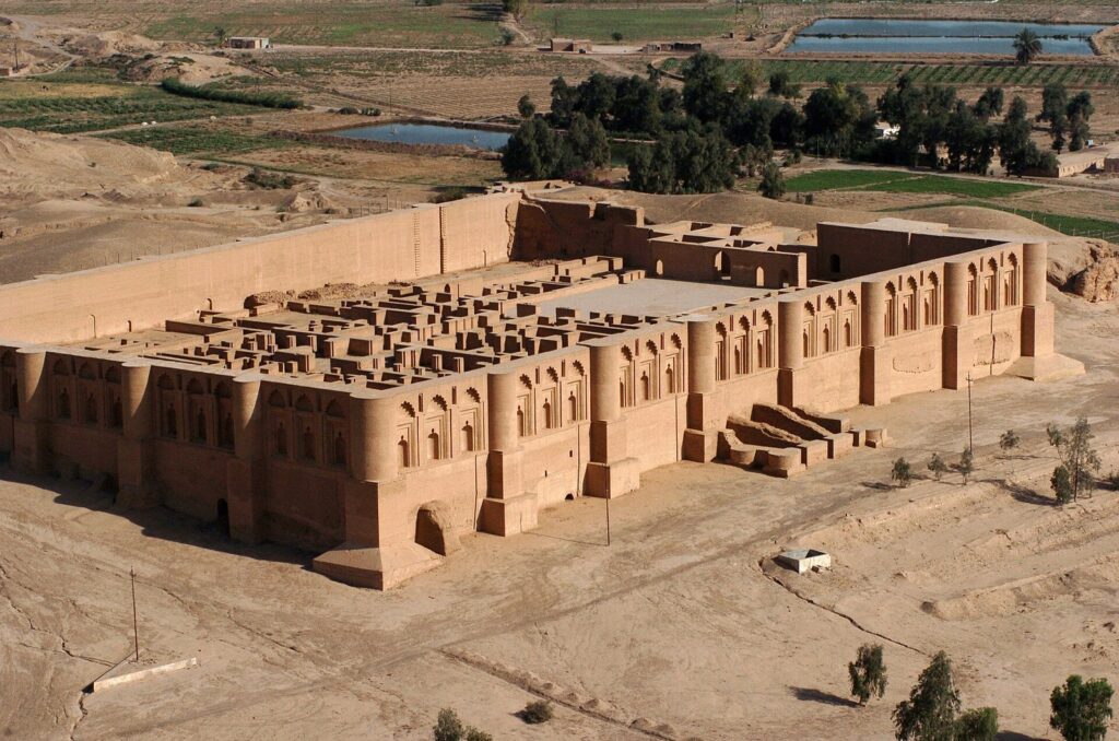 Aerial view of Qasr al-Ashiq, a restored Abbasid palace with arched brick façades on the west bank at Samarra