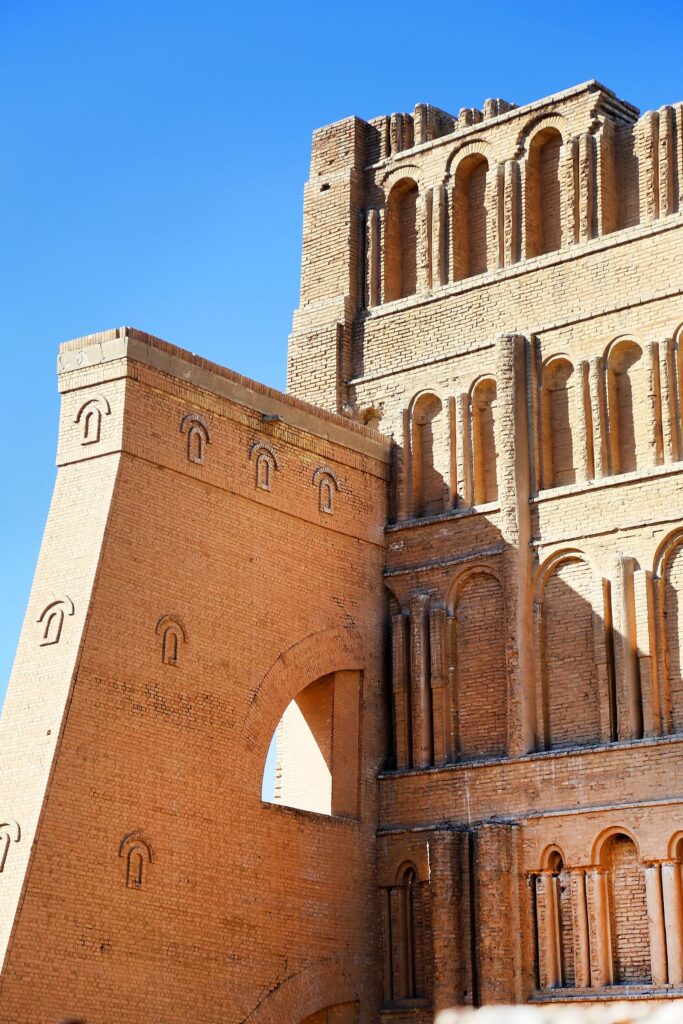 Detail of the Taq Kasra façade at Ctesiphon, with tiers of blind arches in pale fired brick