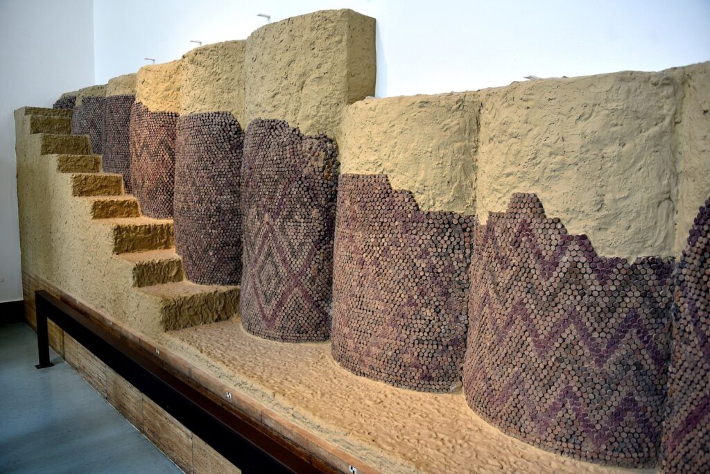 Reconstructed columns covered in coloured clay-cone mosaics from the Eanna precinct at Uruk
